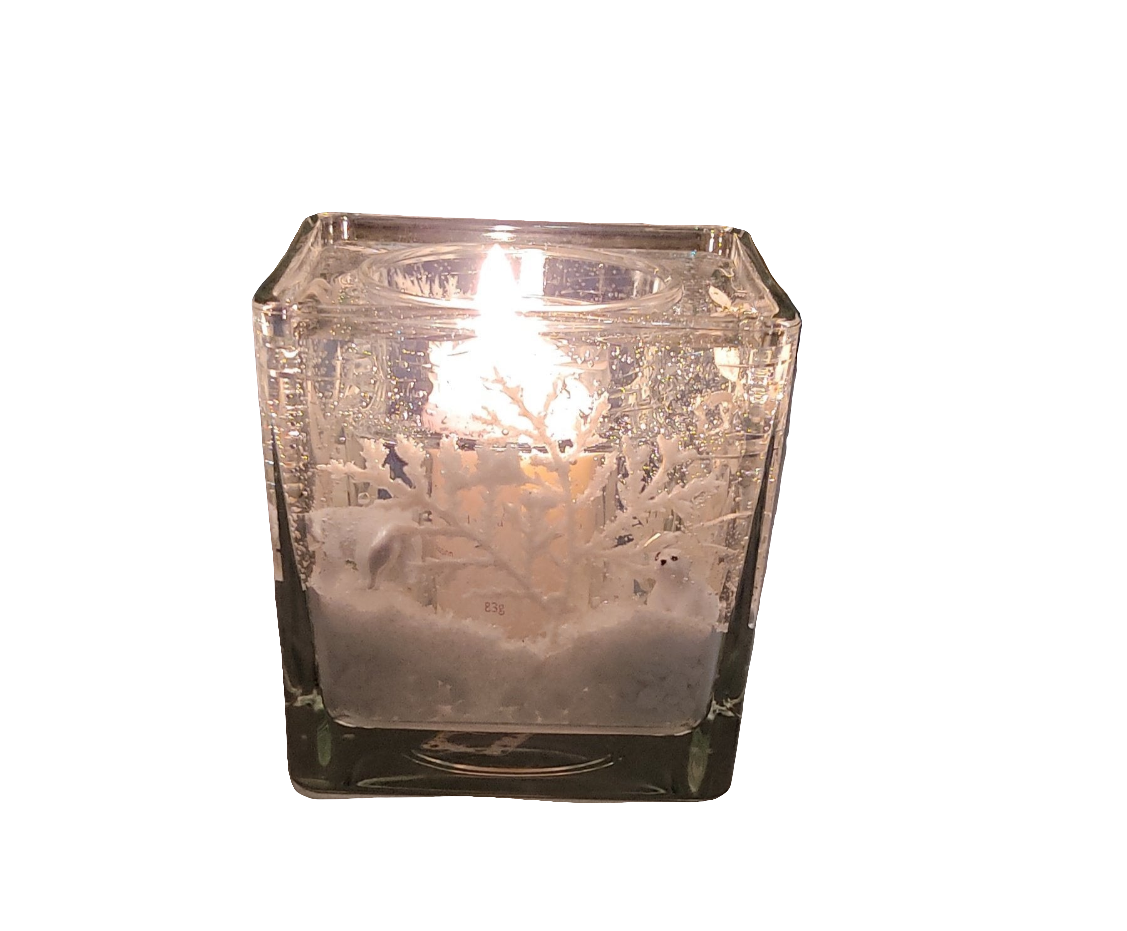 Photophore décoratif avec ours polaires et particules scintillantes, idéal pour décoration intérieure.