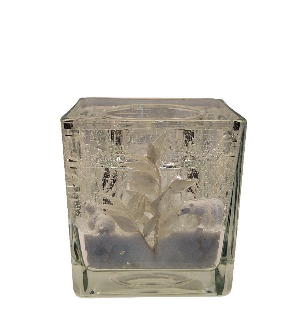 Photophore en verre avec effet neige, ajoutant une touche élégante à votre intérieur.